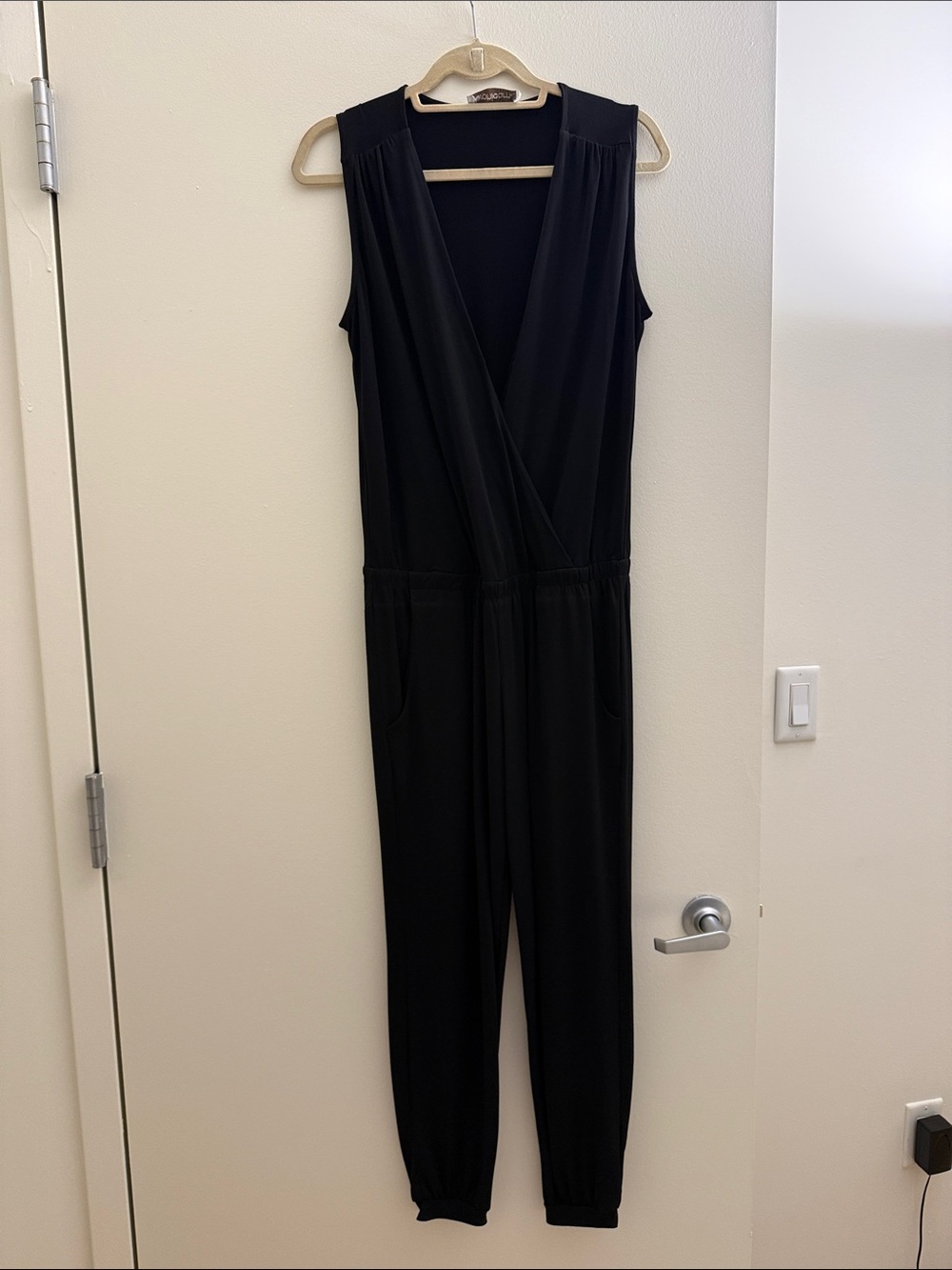 Sleeveless Black Wrap-Front Jumpsuit with Elastic Waist